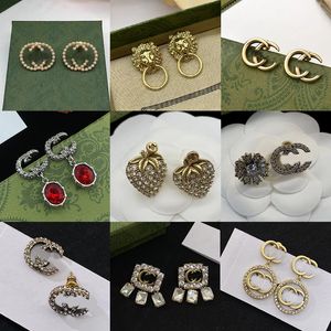 Merk mode klaver oorbellen luxe kristal volledige diamant drie bloem oorbellen cadeau van hoge kwaliteit 18k gouden designer oorbellen voor vrouwen