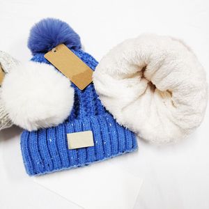 Bonnet de ski tricoté de marque à la mode pour femmes, bonnet de styliste à brides épaisses et pelucheuses, chapeau chaud d'hiver Pom Pom en fil épais