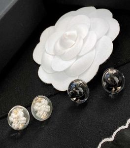 Marque de mode perle bijoux noir blanc boucles d'oreilles acrylique noir rond camélia fleur boucles d'oreilles conception de fête de mariage boucles d'oreilles 9192539