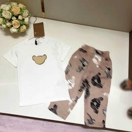 Marque enfants vêtements de marque bébé survêtements Taille 100-160 CM Ensemble d'été en deux pièces Motif visage d'ours imprimé garçons T-shirt et pantalon 24Mar