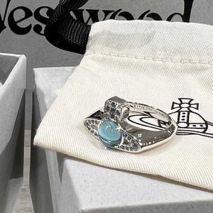 Brand Lake Blue Transit Perle Anneau pour la personnalité des femmes et les perles transparentes du tempérament pleines de diamants Saturn Nail