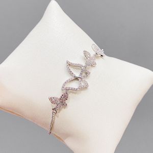 Bracelet papillon en zircon brillant pour femmes, marque de luxe, version coréenne, personnalité de la mode, plaqué or 18 carats, accessoires de bijoux à main, cadeau 2023