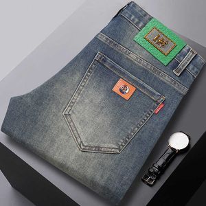 Marque Jeans haut de gamme Luxury Mens Slim Fit Small Straight Tube Elastic Casual Pantal Long Trendy Version coréenne polyvalente