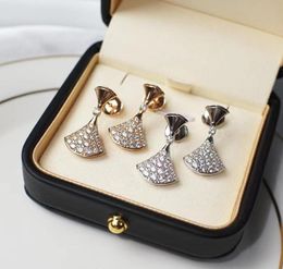 Brand Jupe de luxe Designer Boucles d'oreilles étalon pour les femmes 18k Gold Love Heart rose brillant Crystal Diamond Pendant les trèfles d'oreille Earn8821517