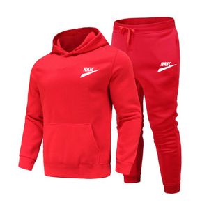 Marque hommes sport ensembles décontractés hommes survêtements nouveaux hommes sweats à capuche pantalon deux pièces costume survêtement mode couleur unie