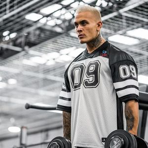 Camiseta de marca para hombre, camisetas transpirables de secado rápido, camiseta de fútbol para hombre, camisa deportiva suelta Bodybuildi talla MXXL 240227