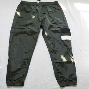 Brand Mens Designers Stone Pant Metal Metal Nylon Cargo Pank Pocket brodered Badge Casual Caseter Pantal Pantal