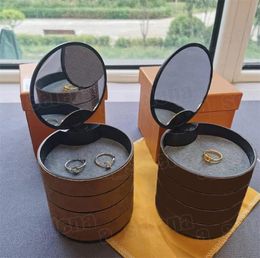 Boîtes de bijoux de marque Mini Taille Boîte de rangement rotative Rack Clip d'oreille Rétro Boîte d'organisation multicouche avec Orange Retail Gift Packagin7303926