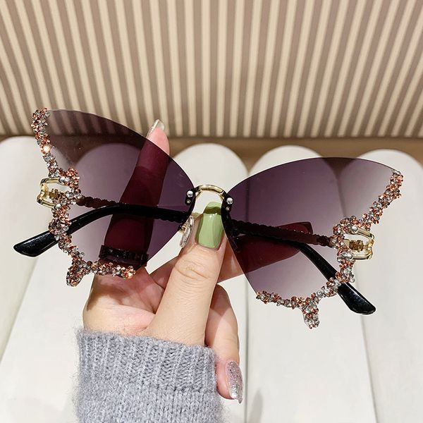 Nuevas gafas de sol de moda sin marco con diamantes en forma de mariposa de alta calidad