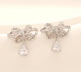 NOUVEAU LUXE LUXE S925 Silver à aiguille en argent Boucles d'oreilles en zircon Tempérament de bijoux Femmes Haut-Fend Zircon Bows Oreilles de haute qualité 75994023