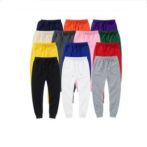 Pantalones de marca para hombre mujer invierno pantalones casuales moda Joggers otoño negro blanco pantalones de chándal polar niña rojo rosa pantalones elásticos X0615