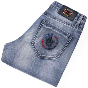 Marque printemps un jean pour hommes coréen Slim Tube droit couleur claire tendance Denim pantalon