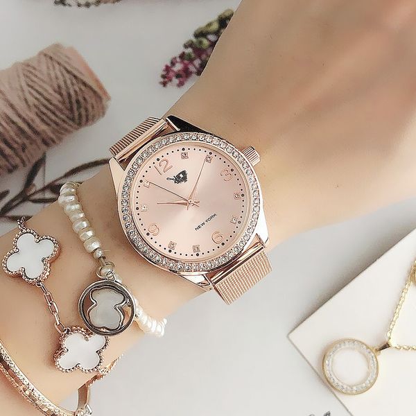 Reloj de pulsera de cuarzo con banda de acero y metal estilo carruaje de cristal para mujer y niña CO14