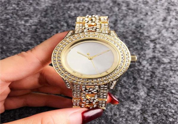 Marque regarde les femmes Lady Girl Big Letters Crystal Style Metal Steel Band Quartz Wrist Watch M64499427989