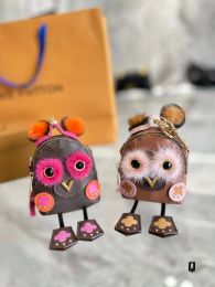 Marque Femmes clés portefeuilles Designer Dog Elephant Shell Coin Bourses Keychain Mignon Owl Mini sac à dos Dames Sac à cartes à fermeture éclair