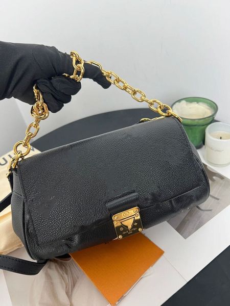 Paquetes de día de marca para mujer 2023 nuevo bolso FAVORITO crema fresa cuero acero estampado negro estampado versátil bolso de nube