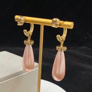 Boucles d'oreilles à charme pendant Pink Pink / Black Pink Pink Pink / Black Perle pour femmes, disponible en 2 couleurs, créateur chic, Pâques, Halloween, cadeau, de haute qualité avec boîte