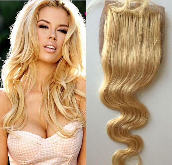 Brasileño Rubio Body Wave Base de seda Parte media nudos blanqueados con cabello de bebé Parte Cabello virgen humano suizo 613 Closu8656929