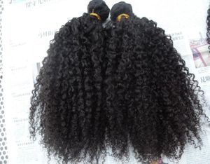 Braziliaans krullend haar inslag hair extensions onbewerkt krullend natuurlijk zwart menselijke extensions kunnen geverfd worden3134060