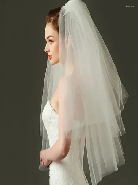 Voiles de mariée élégant bord coupé à deux couches gonflé tulle avec peigne accessoires de cheveux de mariage