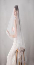 Voiles de mariée avec bord de ruban, deux couches de Tulle, vente élégante, voile de mariage, longueur du bout des doigts, ivoire, BWV6096241230
