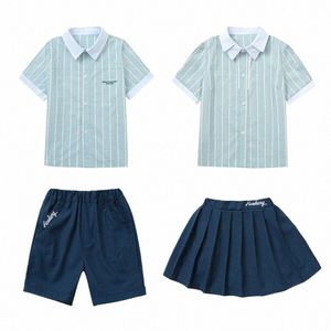 Britse stijl kleuterkleding basisschooluniformen zomer verticale strepen shirt marineblauwe rok shorts studentenoutfits y6go #
