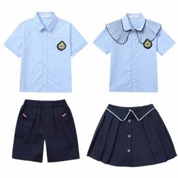 Britse stijl kleuterschool basisschooluniformen zomershirt marineblauwe rok shorts studentenoutfits voor kinderen jongens meisjes m78x #