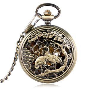 Bronce Vintage Hollow Out Case Diseño de grúa Cuerda manual Reloj de bolsillo mecánico Número romano Dial Reloj unisex FOB Colgante Cadena reloj de