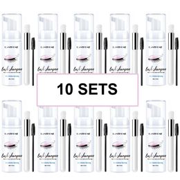 Brosses 10sets 50ml Kit de nettoyage de mousse de cils professionnel Kit d'extension de cils individuel colle shampooing cils cils démaquillant + brosse