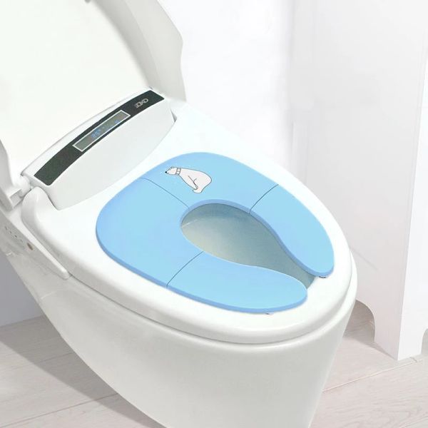 Pinceaux pliants voyages de pot siège voyage portable sur un siège de toilette