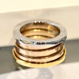 BU Anillo de primavera Oro Plata EE. UU. Tamaño 5-12 Chapado en oro Anillo de diseño de 18 quilates para mujer para hombre pareja Regalo de aniversario de lujo de estilo clásico de alta calidad de contador 037