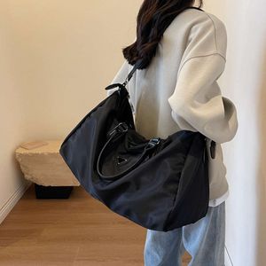 Sac de godet créateur de marque chaude nouveau sac de voyage de mode féminine femme grande capacité épaule oxford tissu sac à dos tendance