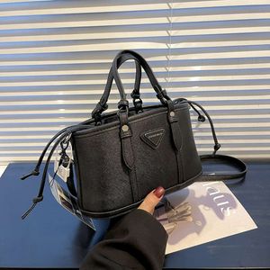 Emmertasontwerper verkoopt merk-unisex-tassen Nieuwe tas Dameshandtrekkoord met stijlvolle textuurschouder