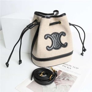 Sac seau sac messager designer cel Toile seau en cuir fendu La peau de vache a une belle capacité Sac en toile de vachette 2023 Printemps Nouveau Sac Seau Grande Capacité Z YEQR