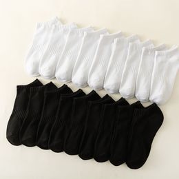 Calcetines deportivos de tobillo al por mayor a granel para hombres y mujeres que usan calcetines para correr y calcetines de algodón informales