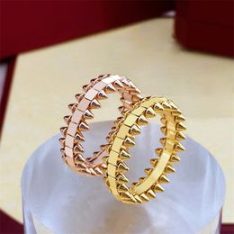 Cabeza de bala Anillos Anillo remache pirámide giratoria Pareja titanio acero Moda Calle Clásico mujer mujer diseñador lujoso regalo letra C oro joyería sin decoloración