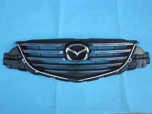 Voorbumper Radiator Grille Met Embleem Badge Halter voor Mazda CX5 2015 2016 KA5C50710 KA5C-50-710 KA0G-50-721A KA0G-51-730 mascotte