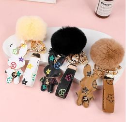 Lapin Design Porte-clés Anneau Pompon Boule Lapin Sac Pendentif Charme Porte-clés Boucle Cadeau Bijoux Accessoires PU Cuir Marron Fleur Animal Lanière Voiture Porte-clés