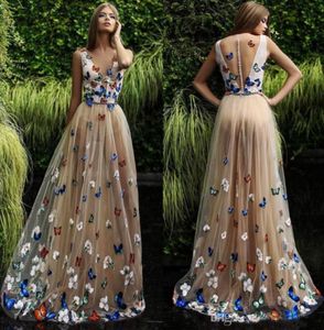 Robes de bal papillon et fleur 2019 col transparent sans manches longues robes de soirée dos boutons couverts arabe robe de soirée formelle Cus9619807