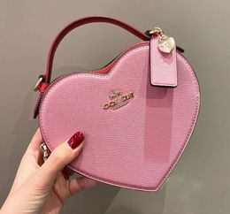 C Desinger Heart Bag Mini Cute Shoulder Bag Women Coabag Handtas Vintage Bewolkte Tote Leather Fashion Pink Body 18-15-6.5 cm
