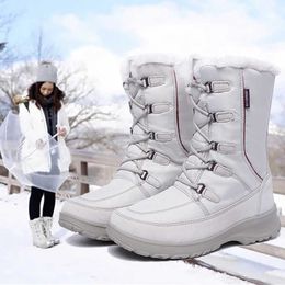 Kameel Officiële vlaggenschipwinkel Noordoostelijke outdoor Sneeuwschoenen Dames Waterdicht en Anti Slip Mid Tube Plush Dikke Village Ski