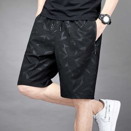 Shorts de camouflage pour hommes en soie mince de glace mince pantalon pentagonal de grande taille