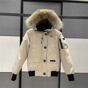 Hombres canadienses Piloto Chaqueta de plumón Real Lobo Piel con capucha Lona Parkas Carta Parche Cremallera Bolsillos Cálido Grueso Outwear Diseñador Mujeres Invierno Ganso Abrigo 1v0d8