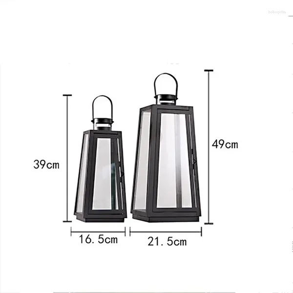 Soportes de velas Arte de hierro Minimalista Europeo Lámpara de viento de vidrio portátil Babrandero Decoración del corredor de velas Soporte de metal retro