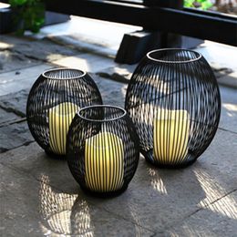 Kaarsenhouders holle ijzeren houder kandelaar lantaarn geometrische vormen centro de mesa zwarte salontafel woonkamer huisdecorcadescandle
