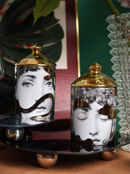 Candlers Luxury Gold Ceramic Storage Jar Face Abstract Face Bodile Boîte à coton Cotton Boîte de bijoux avec un récipient de rangement de cuisine au couvercle 230817
