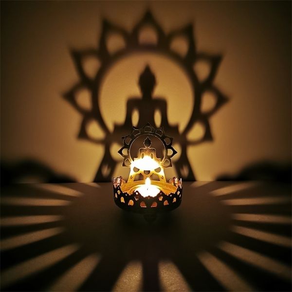 Bougeoir Bouddha Beurre Lampe À Huile Assis Bouddha Lotus Caractéristique Métal Creux Sculpté Lumière Et Ombre Art Chandelier 210727