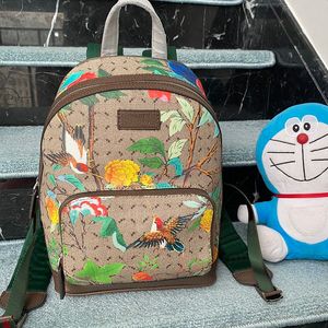 Mochila de lona Bolso de hombro para mujer Bolsos de viaje para hombres Letras clásicas Patrón animal Cremallera interna de cuero genuino Mochilas de mano con correa de tela de calidad superior