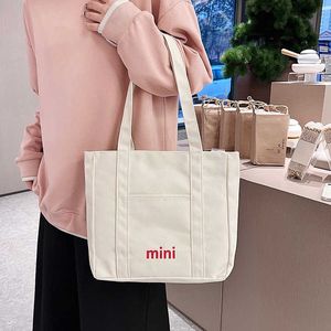 Sac en toile, artistique à la mode, sac à bandoulière simple polyvalent pour jeunes femmes, sac à main de grande capacité du japon et de la corée du sud, sac de Shopping 240315