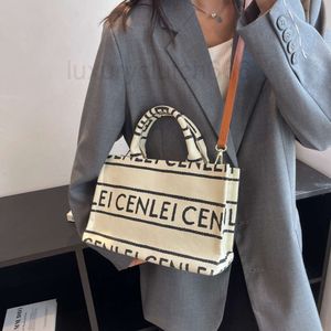 Capaciteitsontwerper cel canvas tassen onderarm grote pakket schoudertassen draagtas voor vrouwen nieuwe eenvoudige en trendy een schouder crossbody tas bedrukte brief